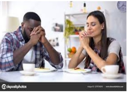 People praying grace