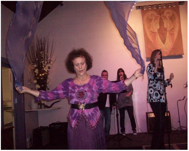 Woman in church dancing with ribbons